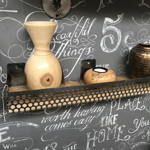 Small shelf with perforated mesh detail surround