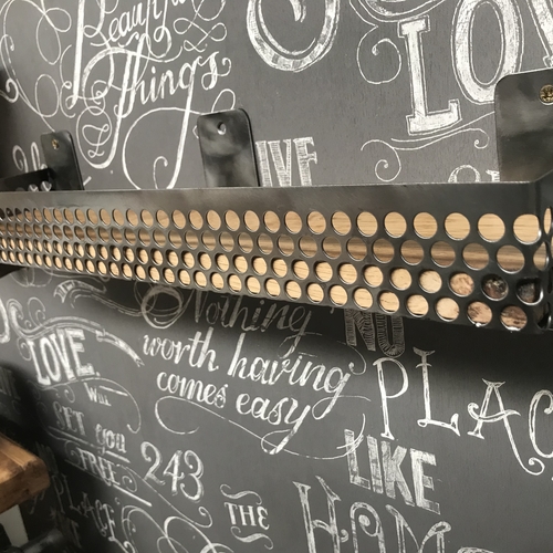 Small shelf with perforated mesh detail surround