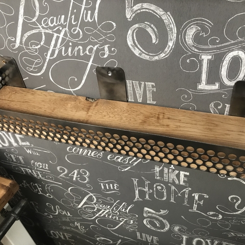 Small shelf with perforated mesh detail surround