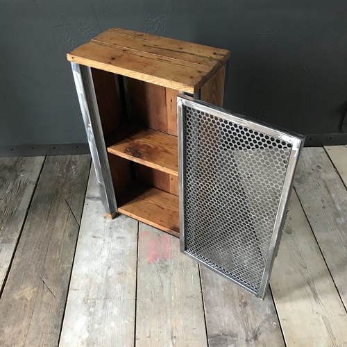 Small industrial cupboard with perforated mesh door