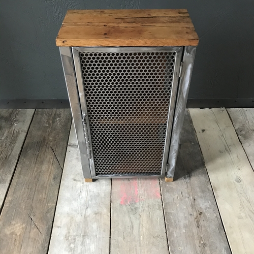 Small industrial cupboard with perforated mesh door