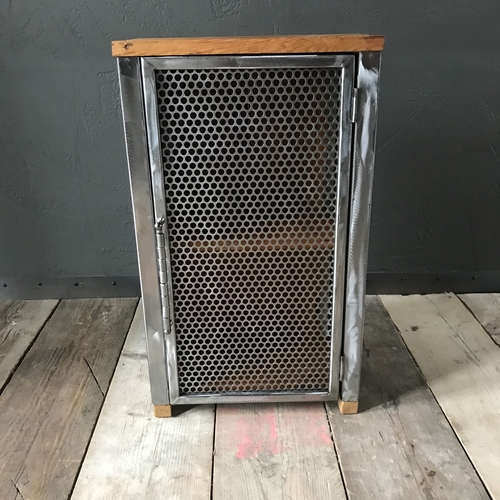 Small industrial cupboard with perforated mesh door