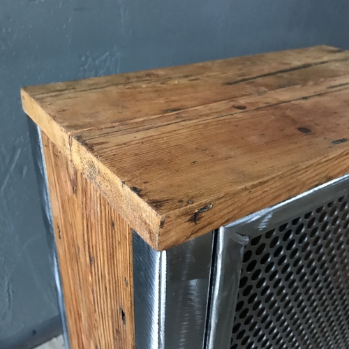 Small industrial cupboard with perforated mesh door