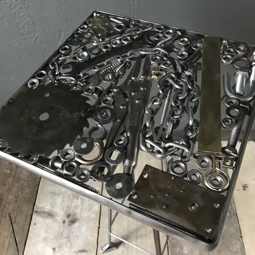 Handcrafted ‘bits and pieces’ metal table