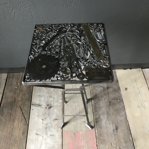 Handcrafted ‘bits and pieces’ metal table