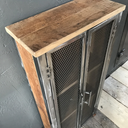 Bespoke cupboard with double mesh doors using reclaimed wood