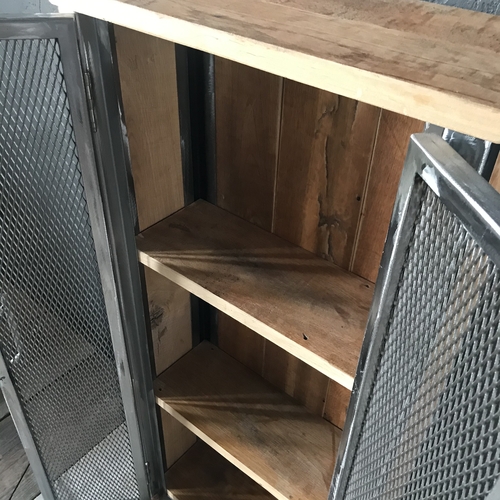 Bespoke cupboard with double mesh doors using reclaimed wood