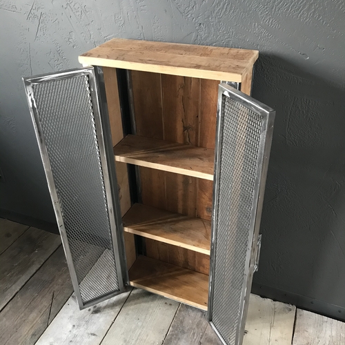 Bespoke cupboard with double mesh doors using reclaimed wood