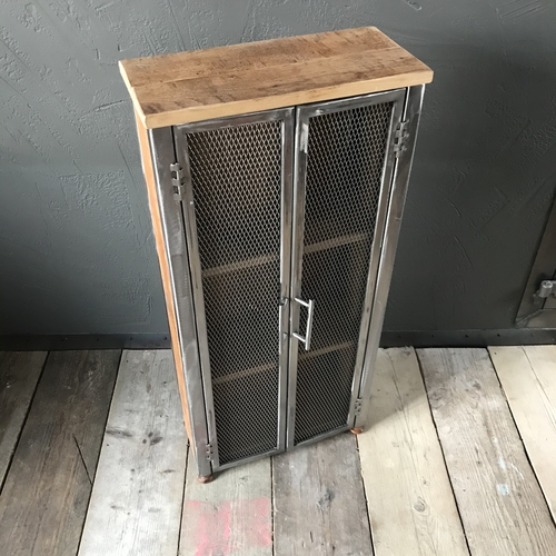 Bespoke cupboard with double mesh doors using reclaimed wood