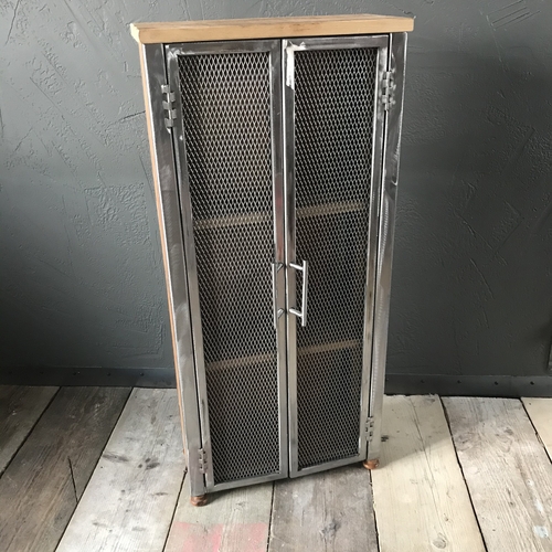 Bespoke cupboard with double mesh doors using reclaimed wood