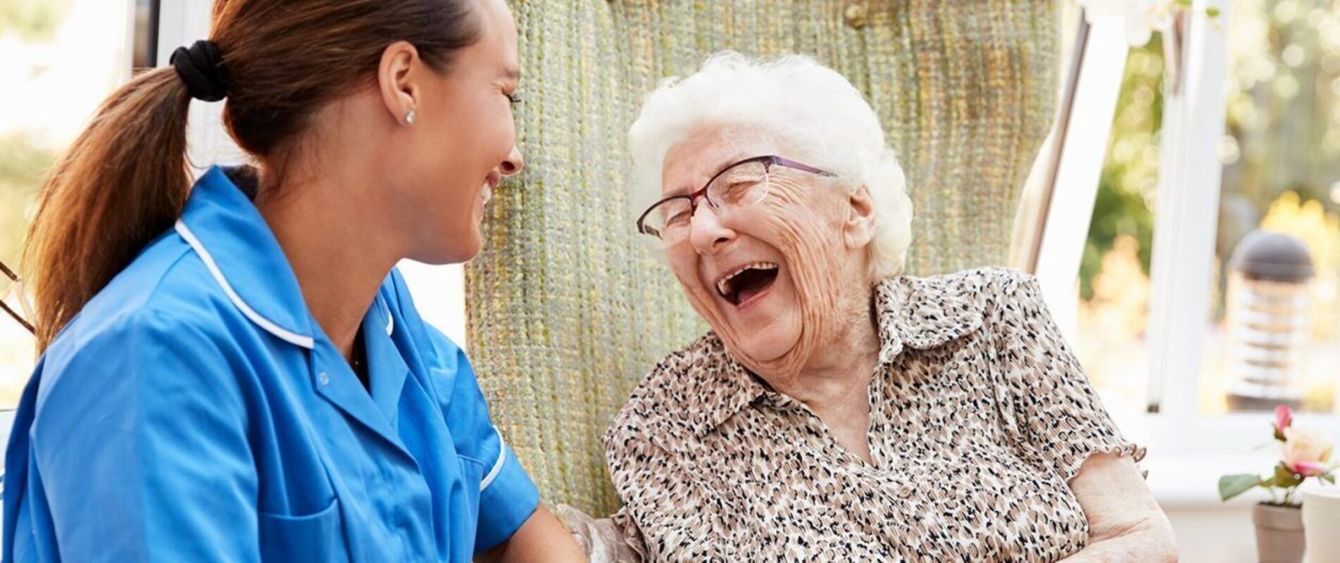 Care worker supporting people in a care setting