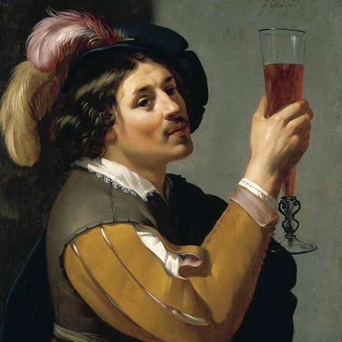 Young Man Drinking a Glass of Wine