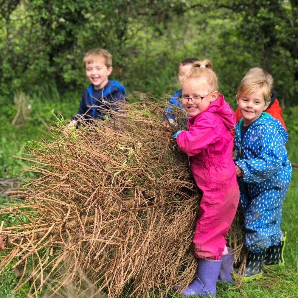 Outdoor forest school learning at Preschool near Hurstpierpoint