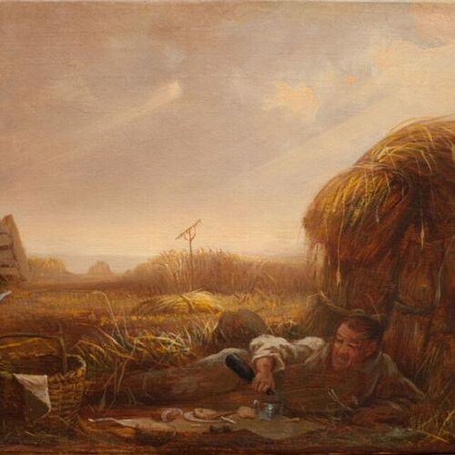 Man Eating in a Field
