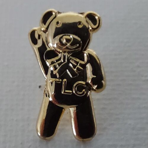 TLC Gold coloured Pin