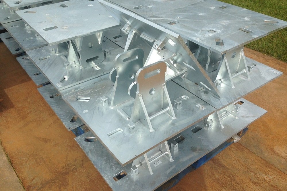 Securing of large temporary structures using bespoke base plates