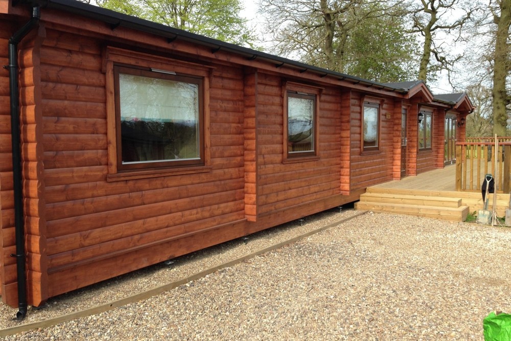 Permanent anchors for log cabins