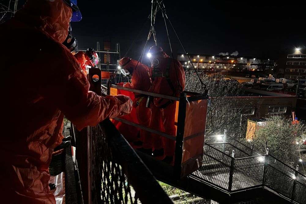 Removal of asbestos pipe over main railway line