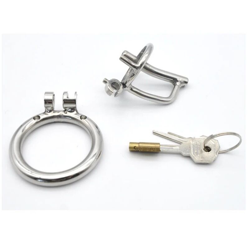 Nessus Play stainless steel chastity cage with urethral control and stealth ring
