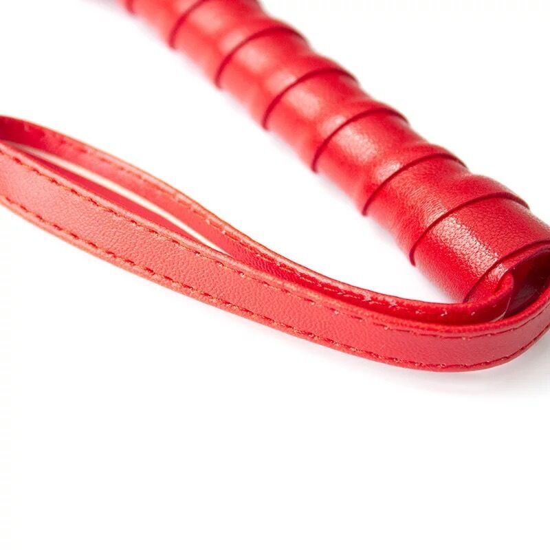 Nessus Play coloured leather flogger for BDSM games and bondage play