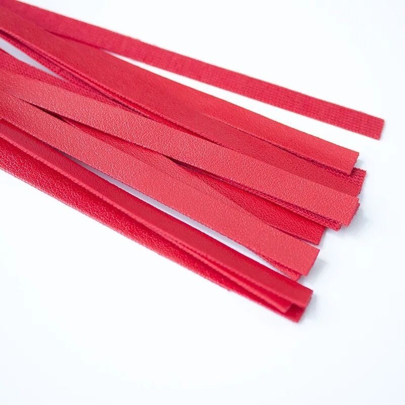 Nessus Play coloured leather flogger for BDSM games and bondage play