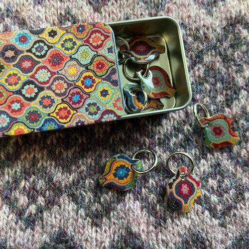Mystical Lanterns Stitch Markers in a Tin from Emma Ball by Janie Crow