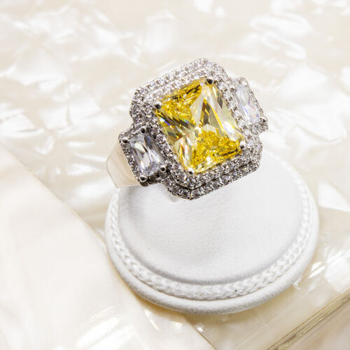 925 sterling silver ring set on yellow moissanite stone