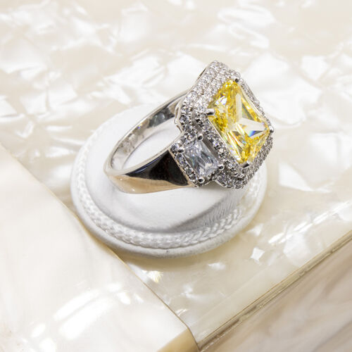 925 sterling silver ring set on yellow moissanite stone