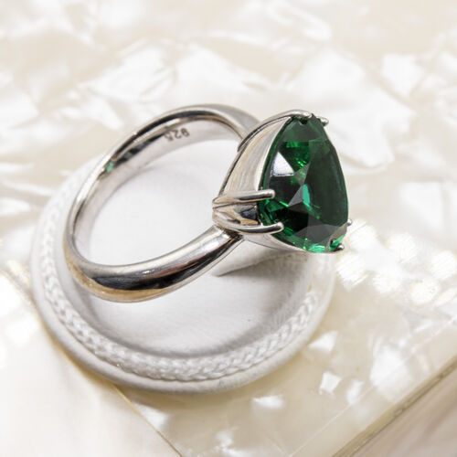 Trillion cut rhodium plated green natural gem stone set on 925 sterling silver