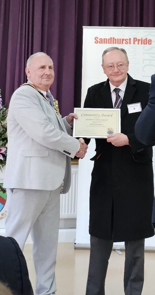 Our Bus Driver Mark Saunders receiving his community Award