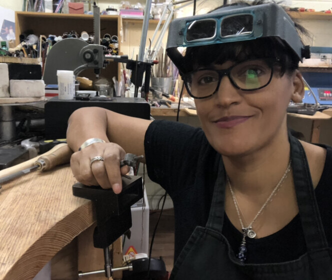 Designer Sarah at her workbench
