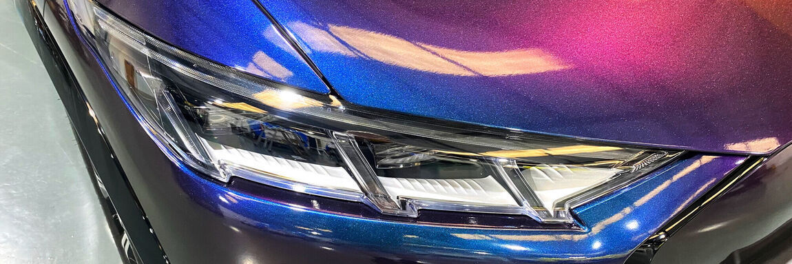 New blue vehicle colour change wrap on a car