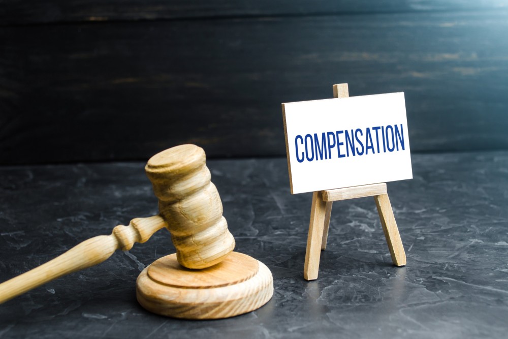 How are claim management companies instrumental in winning compensation?