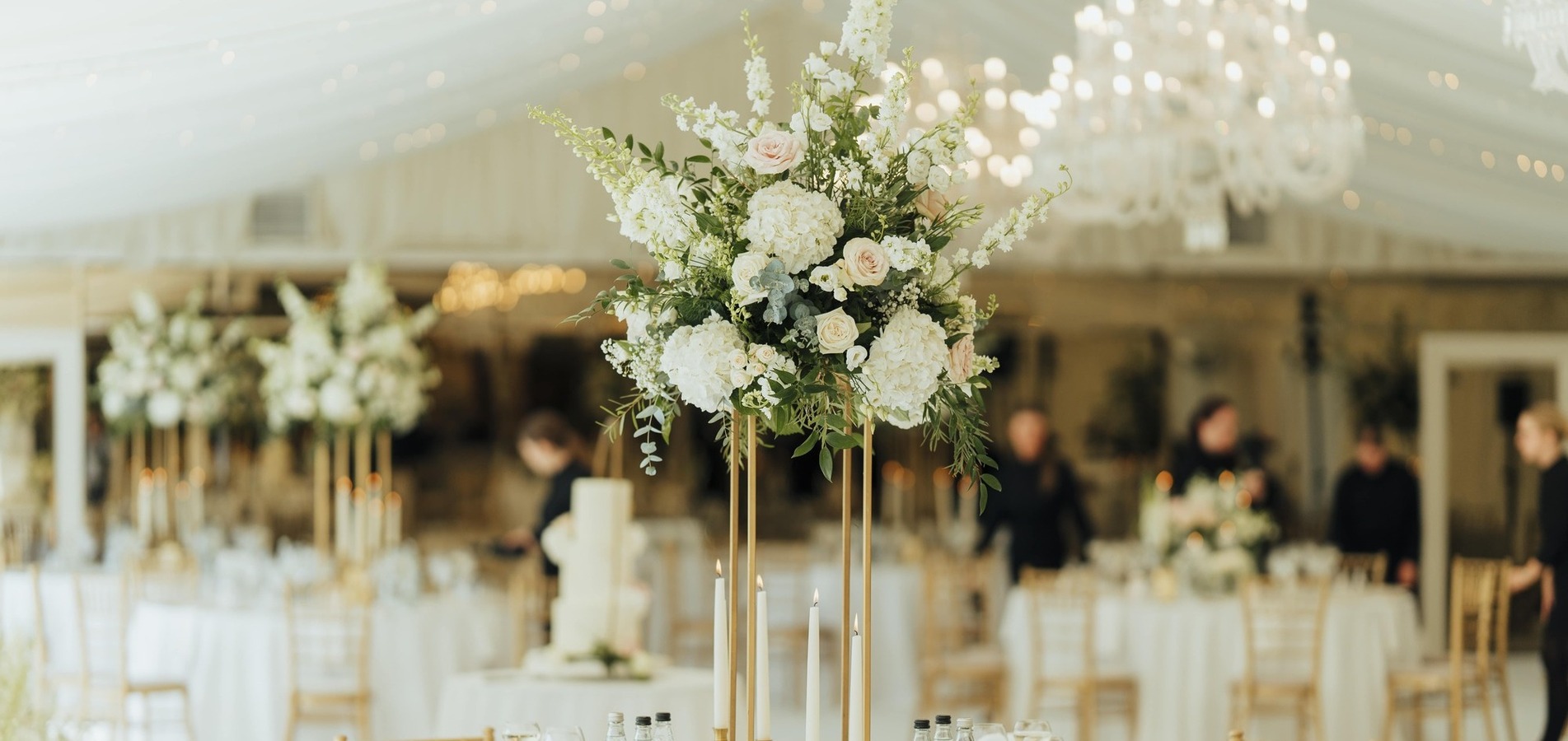 gold themed wedding floral table centrepiece