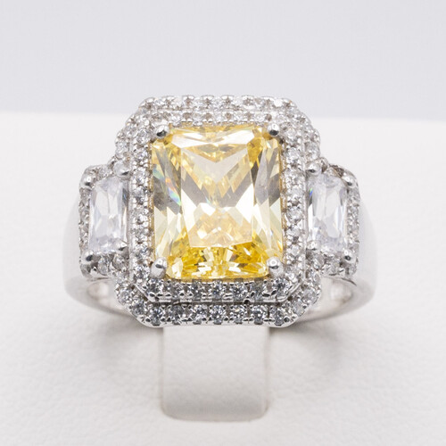 925 sterling silver ring set on yellow moissanite stone