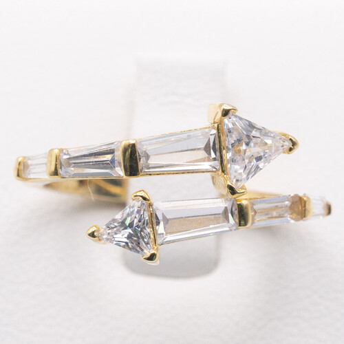 Baguette cut zirconia stones set vertically on yellow gold plated silver ring