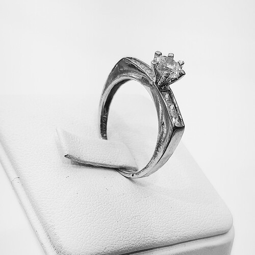 Solitaire zirconia stone set on rhodium plated 925 sterling silver ring