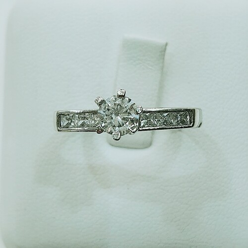 Solitaire zirconia stone set on rhodium plated 925 sterling silver ring