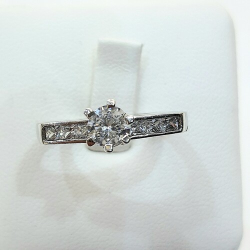 Solitaire zirconia stone set on rhodium plated 925 sterling silver ring