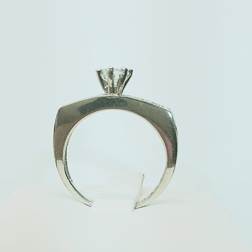 Solitaire zirconia stone set on rhodium plated 925 sterling silver ring