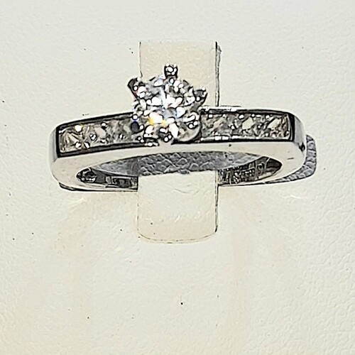 Solitaire zirconia stone set on rhodium plated 925 sterling silver ring