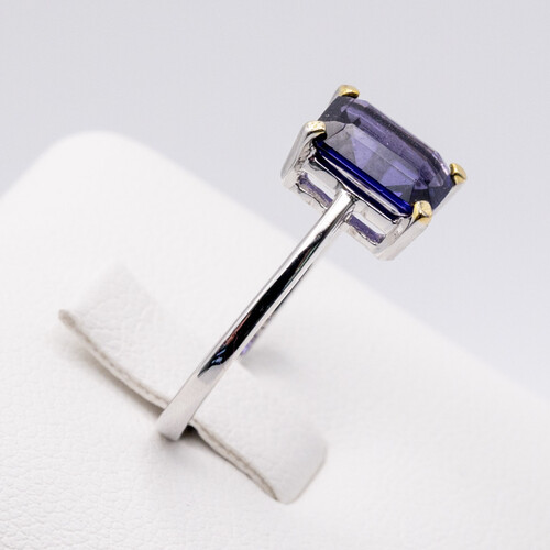 Rectangle cut solitaire purple zirconia set on rhodium plated 925 sterling silver ring