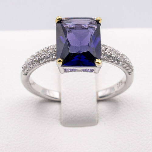 Rectangle cut solitaire purple zirconia set on rhodium plated 925 sterling silver ring