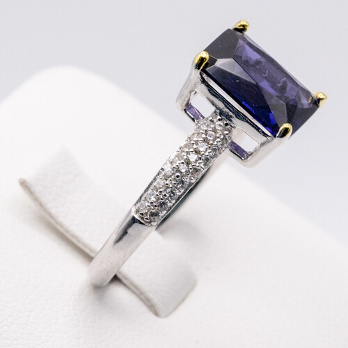 Rectangle cut solitaire purple zirconia set on rhodium plated 925 sterling silver ring
