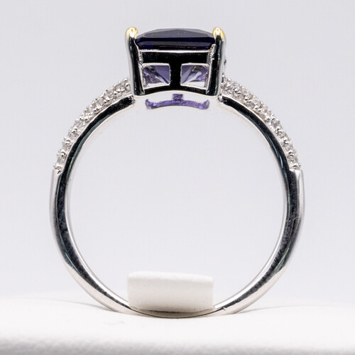 Rectangle cut solitaire purple zirconia set on rhodium plated 925 sterling silver ring
