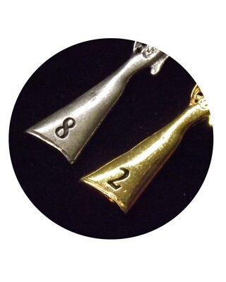 Cartridge shaped holder with pewter Hammer peg finders