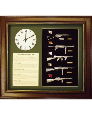 Wall display of miniature military Sub Machine Guns