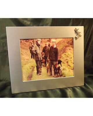 Large single image frame with small pewter Embellishment.