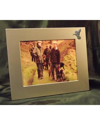 Large single image frame with small pewter Embellishment.
