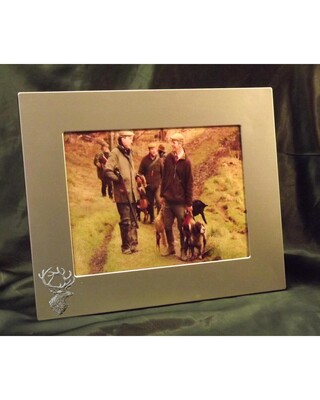 Large single image frame with small pewter Embellishment.